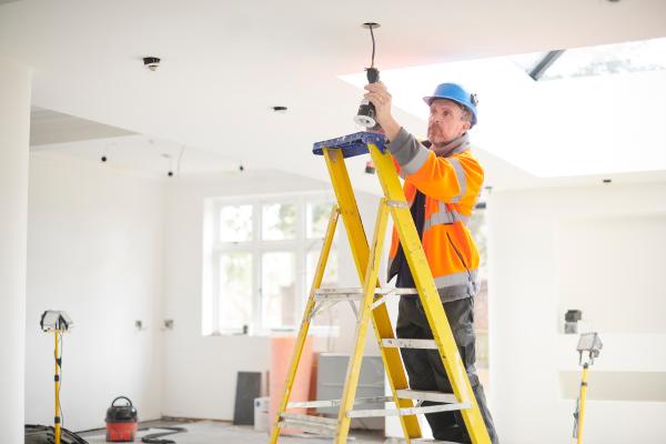 Electricians working in an office space